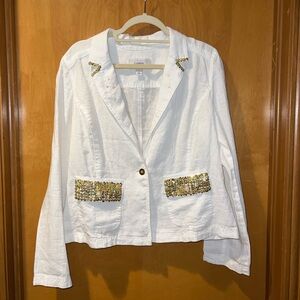upcycled white linen top with gold sequin accents and star embroidery detailing